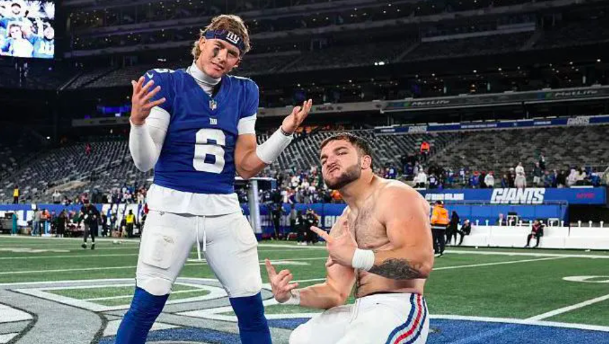 Jaxson Dart (left) and Cam Skattebo pose for a photo after beating the Philadelphia Eagles at MetLife Stadium on October 9, 2025 in East Rutherford, New Jersey. (Photo by Kathryn Riley/Getty Images) (Kathryn Riley via Getty Images)