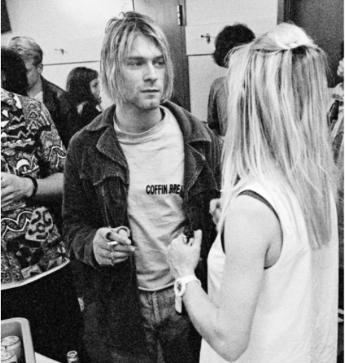 Kurt Cobain and Kim Gordon mid conversation